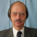 Dr. Kőrös András