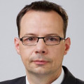 Dr. Simon Attila